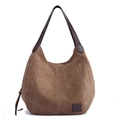 Brown canvas hobo bag with dark leather trim and large capacity compartments - Brown