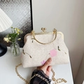 Cream straw woven clutch bag with floral embroidery and golden metal ring handle - Pink