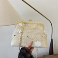 Vintage beige straw handbag with white floral embroidery and gold metal clasp - White
