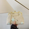 Beige woven straw frame bag with blue floral embroidery and gold metal hardware - Green