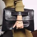 Classic black leather envelope clutch with integrated handle and magnetic flap closure - Black