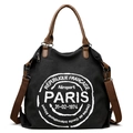 Grande borsa tote in tela nera con manici in pelle marrone e stampa bianca di Parigi - Nero