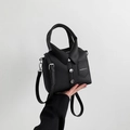 Black shirt-shaped handbag in pebble leather with metallic buttons and a long shoulder strap - Black