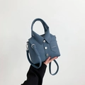 Morandi blue shirt-shaped shoulder bag in premium pebble leather with silver buttons - Blue