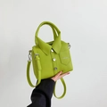 Fashionable lime green leather handbag with unique shirt collar design and silver buttons - Green