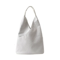 Minimalist white quilted hobo bag in waffle texture fabric with wide shoulder strap - White