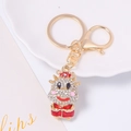 Golden zodiac ox keychain with white rhinestones and red Chinese outfit details - Red Traditional Costume Style (Color 9)