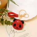 Sparkling red rhinestone panda keychain with a golden clasp and red strap detail - Red with Faux Leather Strap