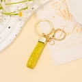 Porte-clés en cuir doré avec strass jaunes brillants et anneau de fermeture en métal - Strass Jaune