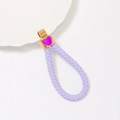 Dettaglio portachiavi in pelle intrecciata viola con fibbia in metallo a forma di cuore - Cordino Intrecciato Singolo / Lavanda