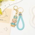 Sparkling crystal rabbit keychain with sky blue woven strap and golden Fu character charm - Sky Blue Rope + Blue Rhinestone Rabbit