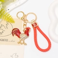 Porte-clés coq en métal doré avec strass scintillants et dragonne en cuir tressé rouge - Coq Rouge Avec Corde En Cuir (颜色2带皮绳)