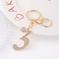 Sparkling gold-tone number 3 keychain with white rhinestones and secure lobster clasp - Number 3