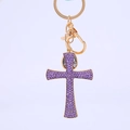 Golden cross keychain variant featuring intricate purple rhinestone crystal pavé - Dark Purple Rhinestone Style (Style 5)