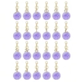 Detail view of purple faux fur ball keychains with gold rhinestone alphabet charms - Purple X