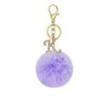 Macro detail of purple faux fur pompom keychain with crystal letter K and gold clasp - Purple K