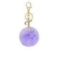 Detail view of purple plush ball keychain with a gold letter T pendant and crystals - Purple T