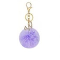 Detail of purple faux fur pompom keychain with golden rhinestone letter W charm - Purple W