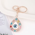 Portachiavi occhio del male a goccia oro rosa con strass colorati e moschettone - Forma a Goccia d'Acqua / Oro rosa