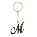 Letter M keychain with black enamel finish and golden metal keyring for bags - Letter M