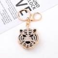 Portachiavi con testa di tigre in lega dorata con strass scintillanti e chiusura a moschettone - Oro