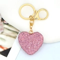 Dettaglio portachiavi a cuore con strass rosa e chiusura dorata in lega lucida - Ciondolo Cuore con Strass Rosa