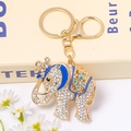 Golden elephant keychain with crystal crown, blue enamel details and lobster clasp - Blue Enamel Pave Diamond Crown Elephant (Color 3)