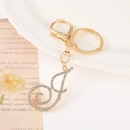 Detail of gold-plated letter J keychain with sparkling crystal rhinestones and lobster clasp - Letter J(J) / Gold