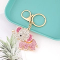 Detailed close-up of elephant keychain featuring pink rhinestones on blue tray - Pink Rhinestone Pave Diamond Crown Elephant (Color 7)