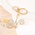 Macro shot of gold letter M keychain with sparkling rhinestones and lobster clasp - Letter N(N) / Gold