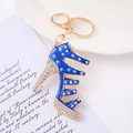 Elegant gold-tone high heel keychain with deep blue enamel and sparkling white rhinestones - Blue