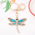 Golden dragonfly keychain with blue crystals and multi-color rhinestones for bags - Blue Navette Stone Style