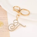 Detail of a gold letter J keychain with sparkling rhinestones and a lobster clasp - Letter T(T) / Gold