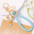Sky blue leather rope keychain with golden Ruyi pendant and cat eye stone charm decoration - Sky Blue Leather Rope Wealth Pendant (Style 2)