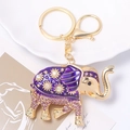 Luxuriöser goldener Elefant Schlüsselanhänger mit lila Emaille und funkelnden Strassblumen - Lila