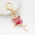 Porte-clés flamant rose scintillant avec strass et finition dorée élégante - Rose