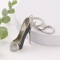 Portachiavi a scarpa con tacco alto in smalto nero con strass e moschettone in argento - Stile 3