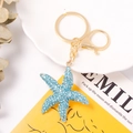 Portachiavi a stella marina con strass blu e anello dorato con chiusura a moschettone - Blu (Colore 3)
