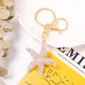Dettaglio portachiavi a forma di stella marina con strass su piatto di ceramica - Bianco (Colore 2)