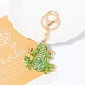 Detail of frog keychain with green rhinestones on gold metal ring and lobster clasp - Light Green Style (A-561)