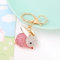 Portachiavi con coniglio scintillante, strass rosa e anello in metallo dorato creativo - Rosa