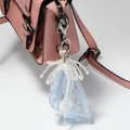 Blue lace ribbon pearl keychain charm on pink textured bag for elegant accessory styling - Light Blue Lace Pearl Bow Style (Style 1)