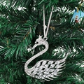 Swan Christmas ornament with silver metal frame and rhinestones on a festive tree branch - Silver White Style (5950685353028)