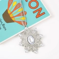Sparkling snowflake metal pendant with rhinestones and oval crystal on a grey cord - Style 2 (Oval Main Stone Snowflake Design)