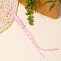 Detailed view of pink and white woven phone strap with a round plastic lobster clasp buckle - Pink White Plaid