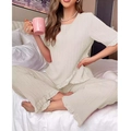 Close-up of pleated cream loungewear set featuring delicate white lace trim details - Apricot