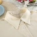 Macro detail of beige satin pajama collar with buttons and elegant lace home decor - S / Top And Bottom / Champagne