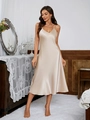 Detail of elegant champagne satin slip dress showing smooth silk texture and V-neck cut - S / Champagne