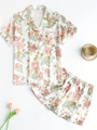 Detailed flat lay of floral satin pajamas with rose patterns and green leaves - S / Green Leaf Floral Print