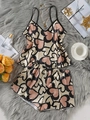 Dettaglio pigiama in raso beige con stampa leopardata a cuore su sfondo di peluche - S / Cuore